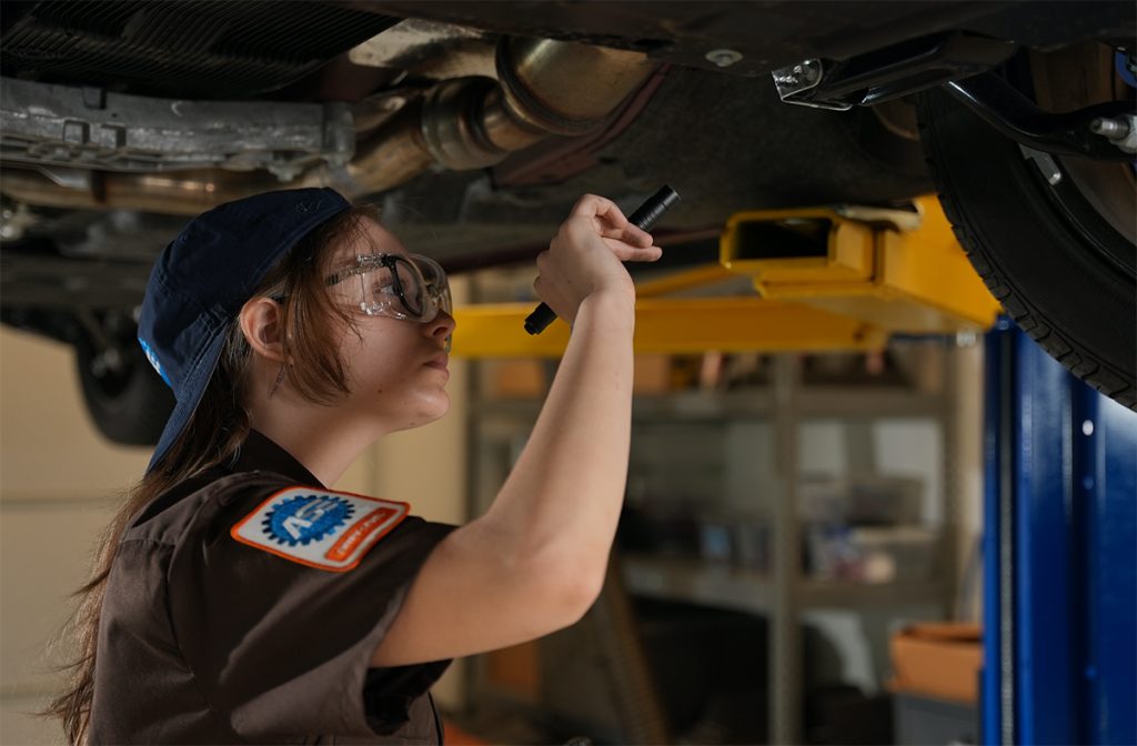 ASE Technician with Flashlight